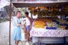 Mum buying fruit - Jalan Kayu