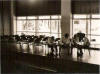 Mr David Long with pupils in the main hall