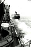 HNlMS Overijssel loading fuel at sea with fleet tanker Bussum 09-08-1962