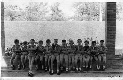 30th Singapore RAF Tengah Cub Pack
Some of the 30th Singapore RAF Tengah Cub Pack on Empire Day 1955 outside the Tengah Primary School. We used to hold our meetings in the school hall on a Wednesday after school.  
The boys from left to right are Barry Mc Williams, Brian Knight,Cliff Hilton, Ray Handley, Robert Taylor, Eddie Dore, Lawrence Taylor, Tom Herbert (whom I have had contact with), Chris Herbert, Harry Dempsey, Randall Hammond and Peter Brown. 
Keywords: Cub Pack;RAF Tengah;Thomas Gilbert;Barry McWilliams;Brian Knight;Cliff Hilton;Ray Handley;Robert Taylor;Eddie Dore;Lawrence Taylor;Tom Herbert;Chris Herbert;Harry Dempsey;Randall Hammond;Peter Brown