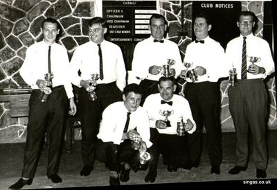Margaret Hood has submitted this photo of a darts presentation at Changi.  She said "I think the year is 65/66 but not sure for certain.  My Dad is the one standing on the far left, his name was Eddie Pierce. After leaving Changi he was posted to Leuchars in Fife.
Keywords: RAF Changi;Eddie Pierce;Darts Presentation;1965