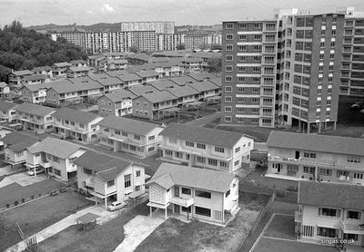 Chip Bee Estate 1966
Here's a picture of Chip Bee Estate at Holland Village.
I am sure the familiar landmark of those red-bricked blocks will be in any Britbat Kid's memory.  Below the blocks at Jalan Merah Saga and Taman Waran were the row of semi-detached, terraced houses and bungalows which were rented by British Army families.  The row of bungalow houses in this photo fronted Holland Road.  The hillock on the left of the photo is Kintyre Park Estate.  The block of flats in the background is Commonwealth Drive at Queensway.
Keywords: Peter Chan;Chip Bee;1966;Holland Village;Jalan Merah Saga;Taman Waran;Kintyre Park