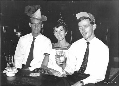 Christmas Day 1967 in hotel bar in Singapore.
Christmas Day 1967 in hotel bar in Singapore after going to the cinema to see Paul Newman in Cool Hand Luke.  Me, Liz and Nick Armstrong
Keywords: Bron Worsnipe;RAF Tengah;1967;Nick Armstrong