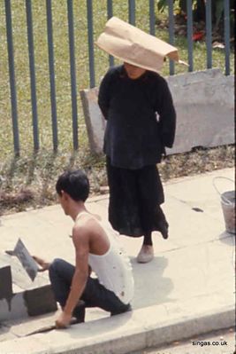Concrete Nanny
Female manual worker from china, dubbed "Concrete Nannies" so called because they adopted kids from poorer families and did manual work.  The money was used to give the adopted kids a good education.  The hats worn were usually red.
Keywords: Concrete Nanny