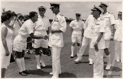 My thanks to Janet Laidlaw for this photo. 

This one was taken at the RN School and shows Mr Silk, the Deputy Headmaster, shaking hands with the Duke of Edinburgh.

The Headmaster, Commander Horton, I think is looking on between them.
Keywords: RN School;Commander Horton;Janet Laidlaw;Mr Silk;Duke of Edinburgh
