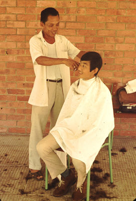St. Johns School, Dover House
A Gurkha Boarder having his hair cut by a local barber who was employed every so often to do a â€˜short back and sidesâ€™
Keywords: St. Johns;Dover House;Boarder
