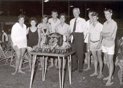 Inter-Departmental Swimming Gala
Inter-Departmental Swimming Galas at Dockyard Swimming Pool (1964-1965) The presentation of shields and cups to the Chief Engineer's Department Swimming Team, May 1965.

Wendy Cocking, ?, Lyn Gilbert, Danny Tope, ?, ?, Barry Bridgen, Tom Williams, Pete Banks
Keywords: Dockyard Swimming Pool;1965;Wendy Cocking;Lyn Gilbert;Danny Tope;Barry Bridgen;Tom Williams;Pete Banks