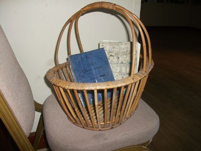 Girls School Baskets
My thanks to Anna Googan for this photo.  These baskets were in daily use by girls in school,  and this original is photographed with school workbooks autographed by friends in 1967.  Baskets were available on every street corner but are impossible to find nowadays.
Keywords: Anna Googan;St. Johns;baskets;1967