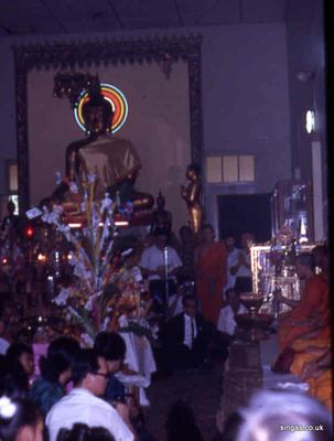 Vesak
Inside the temple.  Note the "money" tree, where notes were placed as gifts for the monks.
Keywords: Vesak;temple;Monks