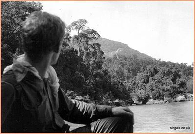 Field Trip to Pulau Tioman â€“ July 1967
Ken Wildon watching the coastline and eyeing up Mount Kajang.
Keywords: Ken Wildon;1967;Mount Kajang