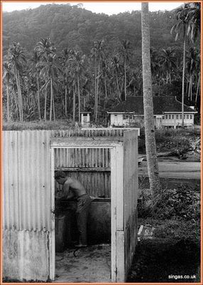 Field Trip to Pulau Tioman â€“ July 1967
Tioman 1967 â€“ ablutions were pretty primitive. The toilet was a hole in the jetty 15 feet above the river (downstream from the village).
Keywords: 1967;Pulau Tioman