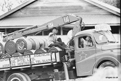 Riding Shotgun
taken in and around Holland Village. Health and Safety certainly didn't exist in those days!"
Keywords: Maurice Hann;Holland Village;lorrys;trucks