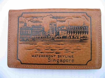 Wallet showing the Singapore skyline
This wallet showing the Singapore sky line has never been
used as still looks in mint condition 35 or so years on.
Keywords: Singapore skyline;Wallet