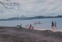 The_beach_at_RAF_Changi_with_HMS_London_and_Malaya.jpg