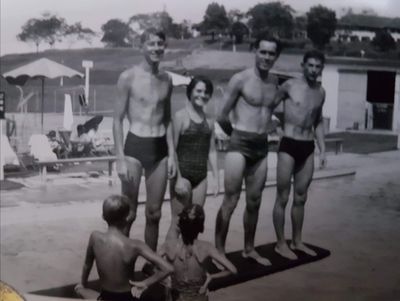 dockyard Swimming Pool 1956
me, with my two brothers and my uncle. 
