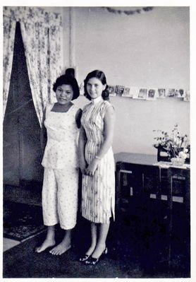 me with our lovely Amah Seng Ng
christmas 1958 - me with our lovely Amah, Seng Ng. at 229e St. johnâ€™s Rd HM Naval Base. 
