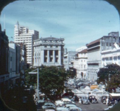 Singapore 1950s - Raffles Place
These photos are over 60 years old, so I assume out of copyright.
