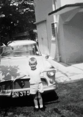 Car and brother in front garden - Island view - 1970
