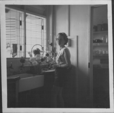 My mum, Trixie Foster at  kitchen of 5 Lancaster Gate, RAF Seletar
