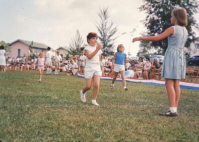 Gill Moffett (in white) taking part in a race at Tengah Primary School
Keywords: Gillian Moffett; Tengah Primary School; 1966