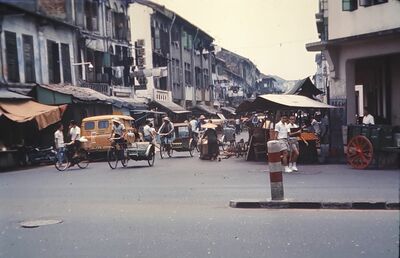 Singapore street scene in 1966 with bicycle rickshaws
Keywords: 1966