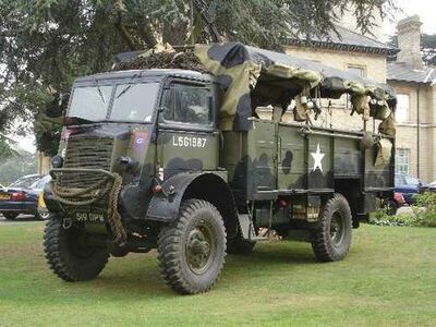 Without the Allied white star this Bedford QL troop carrier was the vehicle that took us to and from Alexandra Primary School each day.  Ours was identified by the letter L.

