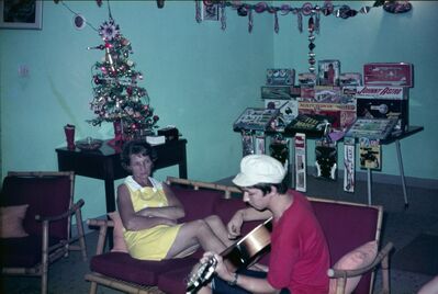 Jalan Chempaka Kuning
Christmas with Geoff playing guitar
