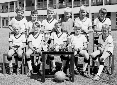 1st Football Team 1969
1st Football Team 1969

the only boy I remember is Martin Cowley, fourth from left in the front row. This was a highly successful team: look at the trophies they won in 1969!
Keywords: Bill Johnston;Wessex Junior;Pasir Panjang Junior;School;1st Football Team;1969;Martin Cowley