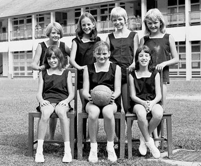 1st Netball Team 1969
1st Netball Team 1969

the only girl I remember is Jennifer Ridge (3rd from left, back row), eldest daughter of John Ridge, the art teacher.

Helen Walkerdene has identified herself on the back row far right.  She said "Far left back row I believe is Mary Bowes, Beverley ???, then Jennifer Ridge and then me.  Front row holding the ball possibly Lynne Gentry??"
Keywords: Bill Johnston;Wessex Junior;Pasir Panjang Junior;School;1st Netball Team;1969;Jennifer Ridge;Helen Walkerdene;Mary Bowes;Lynne Gentry