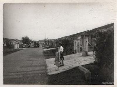 Jalan Malu Malu
Me and my sister waiting for the school bus. We lived in Jalan Malu Malu outside the Naval Base before going to Hobart Road and then Falkland Road.
Keywords: Jalan Malu Malu;Naval Base;John Blyth