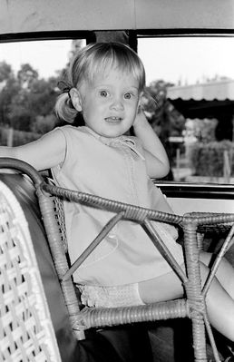 My daughter
My daughter demonstrating the state-of-the-art child safety seat of the 60s in Singapore! Made of wicker, it simply hooked over the bench seat in the front of my Standard Vanguard without straps, anchors or anything else!

Maybe some of the others who look at this web site will remember something similar.
Keywords: Bill Johnston;1968