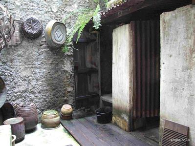 China Town Museum
This was the outside loo, a hole cut into a stone slab, (just out of the picture where the door is
Keywords: China Town Museum