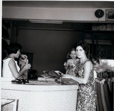 Dressmaker - collecting made to measure dresses at the local dress maker in Serangoon Gardens.
Keywords: Sandra Chidgey;Serangoon Gardens