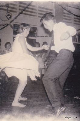 Jenny Jenkins and me winning a Jive Youth Club dance 
Jenny Jenkins and me winning a jive Youth Club dance competition which for some reason I believe was held in Nee Soon.  I was very proud of winning and of that photo.

I had contact with Jenny a few years ago and she sent me pictures of her grandchild and herself.  Unfortunately I had a massive crash on my computer (well two actually) and lots many email addresses and emails.
Keywords: Youth Club;Jenny Jenkins;Nee Soon;Jim Parker