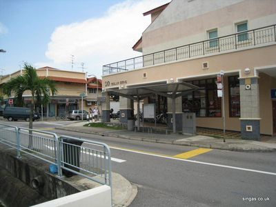 Kampong - left view
photo taken by Chin Siew Min and sent to Keith show Siglap Drive as it is today - 2009.  This new housing and shopping complex stands on the old kampong site opposite No.5 in the 60's.
Keywords: Siglap Drive;2009;Chin Siew Min