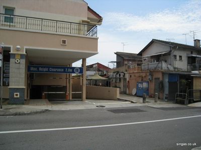 Kampong - right view
photo taken by Chin Siew Min and sent to Keith show Siglap Drive as it is today - 2009.  This new housing and shopping complex stands on the old kampong site opposite No.5 in the 60's.
Keywords: Siglap Drive;2009;Chin Siew Min