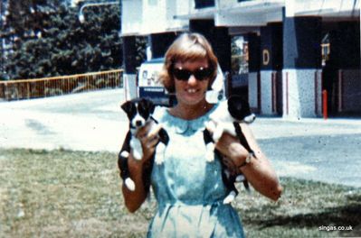 David's mum with two puppies outside D Block Far East Mansions
Keywords: D Block;Far East Mansions