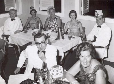 New Year's Eve 1963-1964
 New Year's Eve 1963-1964 at the Dockyard Club.
 
Those featured: (background) Mr & Mrs Jackson from Chatham, Mrs Tope (Danny's mother), Mr & Mrs Harvey from Chatham.
The couple in the foreground are unknown
Keywords: Dockyard Club;1963;RN;Naval Base