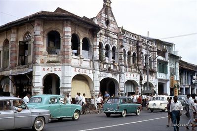 Orchard Road indoor market 1967
After much investigation by the Facebook Group 'On a Little Street in Singapore' it was agreed that this caption title is wrong.  They concluded the photo was taken at Serangoon Road. 211 is at junction of Race Course Lane and Serangoon Road. There is a bus stop on the opposite side
Keywords: Frank Clewes;Race Course Lane;Serangoon Road;1967