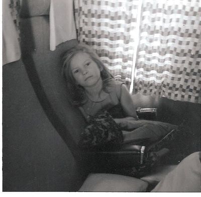 Sandra Chidgey on plane during return flight home - no flat beds in those days!
Keywords: Sandra Chidgey