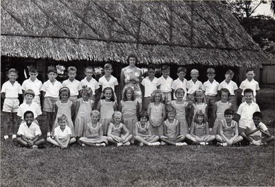 Seletar Junior School 1964
Thanks to Robert Hadden for this photo.  Robert thinks that this photo was taken in 1964. Robert was in Singapore during 1962 to 1965 with his dad Chief Tech Joe Hadden, his mum Gwen and brother Mick and lived at 2 Edgeware Rd RAF Seletar.

Hugh Duff has identified himself as being on the middle row 1st left, with the Beatle haircut.  David Rawson has said that he is standing to the left of the teacher.
Keywords: Seletar Junior School;Robert Hadden;1964;Hugh Duff;David Rawson