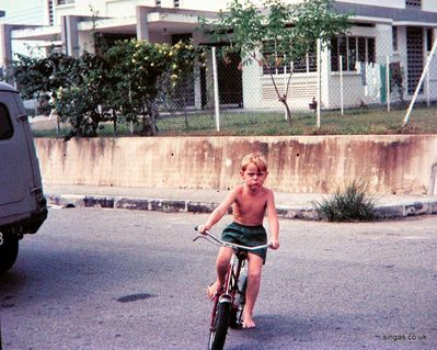 Me on my first bike. No sure if thatâ€™s a miserable face or not!
Keywords: Changi;Andy MacDonald