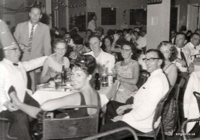 Dockyard Club 31Dec64
Singapore Dockyard Club 31Dec64

Left to right â€“ Harry Slora, Ron, Flo Slora, Gaynor, Bob (Robert) Blyth, Nancy (Agnes) Blyth, Alf Merryweather and Isobel Merryweather
Keywords: Dockyard Club;Harry Slora;Flo Slora;Bob (Robert) Blyth;Nancy (Agnes) Blyth;Alf Merryweather;Isobel Merryweather