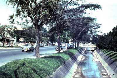 comparatively empty
Two views of the wide, deep monsoon drain on the other side of Orchard Road - one comparatively empty, the other after a typical rainstorm.
Keywords: Bill Johnston;Orchard Road;monsoon drain