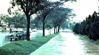 after a typical rainstorm
Two views of the wide, deep monsoon drain on the other side of Orchard Road - one comparatively empty, the other after a typical rainstorm.
Keywords: Bill Johnston;Orchard Road;monsoon drain