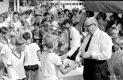 Brigadier Stanley Mullen is seen presenting awards to the Wessex football stars
Brigadier Stanley Mullen is seen presenting awards to the Wessex football stars in, I believe, 1968, with the Head, Mr Vernon, sorting the trophies. Brigadier Mullen instigated the annual Services Drama Festival and that year my wife and I attended every production, Army, RAF and Naval Base, on the night he gave his adjudication
Keywords: Bill Johnston;Wessex Junior;Pasir Panjang Junior;School;Stanley Mullen;1968;football