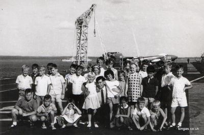 St Andrews Church Youth Club
St Andrews Church Youth Club On HMS Eagle
Front row, second left is Jock Laidlaw, and back row first left is Bryan Allan.
Keywords: St Andrews;Church;Youth Club;HMS Eagle;Jock Laidlaw;Bryan Allan