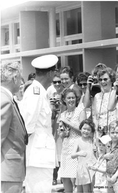 Visit by Prince Philip the Duke of Edinburgh to St. John's in February 1965.
shows Joanne Smith (teacher) having a laugh with the Duke, daughter Amanda with her eyes closed and son Christopher with his sun hat on.
Keywords: St. John&#039;St. Johns;Prince Philip;1965;Duke of Edinburgh;Joanne Smith