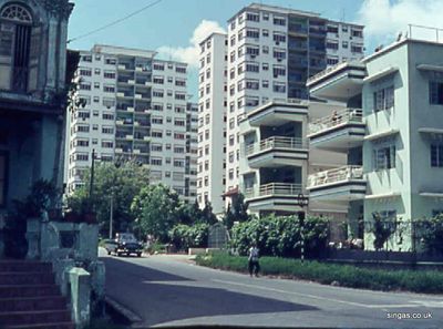 Tanglin Court Hotel
Tanglin Court Hotel in the foreground and Far East behind.  Some families initially stayed at Tanglin Court while waiting for a vacant married quarter.  Posh looking residential flats have since replaced Tanglin Court. 
Keywords: Tanglin Court Hotel