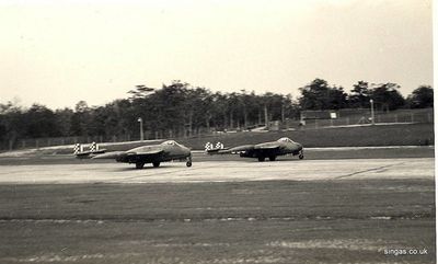 Venoms from 14 Sqn. about to take off
RAF Tengah - Venoms from 14 Sqn. about to take off, bomb dump in background.
Keywords: RAF Tengah;John Simner